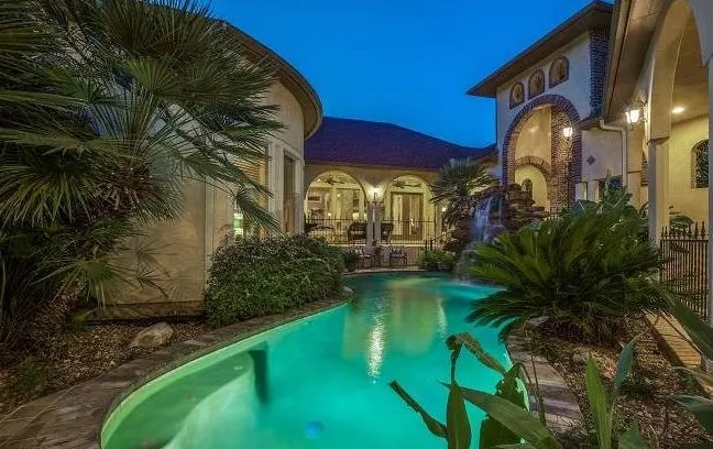 Custom home with pool by Parker Design and Consulting